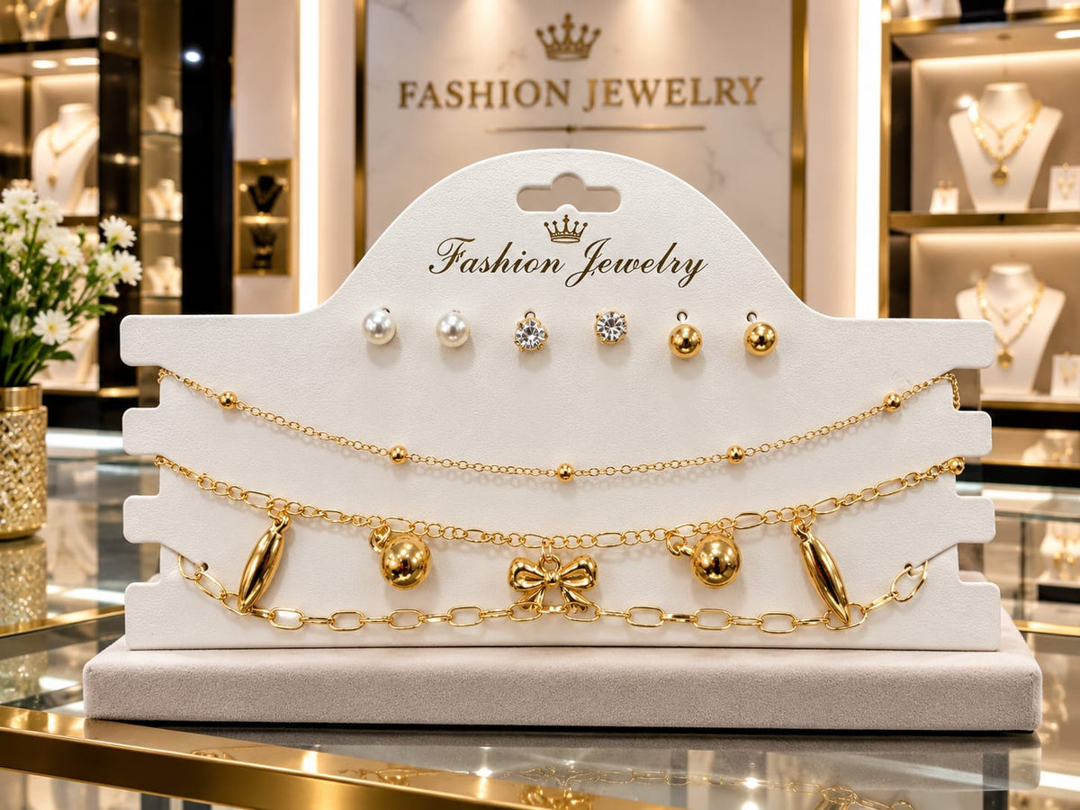 Luxury Gold-Plated Fashion Jewelry Set ✨ Enhance your style with this elegant gold-tone jewelry set, featuring beautiful stud earrings and layered charm bracelets