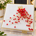 Red Floral Hair Comb – Elegant Bridal Hair Accessory Add beauty and elegance to your hairstyle with this stunning red floral hair comb. Designed with beautiful red flowers