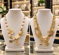 Elegant Gold & Pearl Necklace Set – Premium Jewelry Collection ✨ Enhance your style with these beautiful gold-tone necklace sets, featuring elegant pearl beads, floral charms, butterfly details, and stylish layered chains. Perfect for parties, weddings,