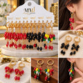 Elegant Gold-Tone Beaded Hoop Earrings – Stylish Fashion Jewelry for Women ✨ Add a touch of elegance and glamour to your everyday look with these beautiful gold-tone dangling hoop earrings. Featuring sparkling faceted beads, ing design, .