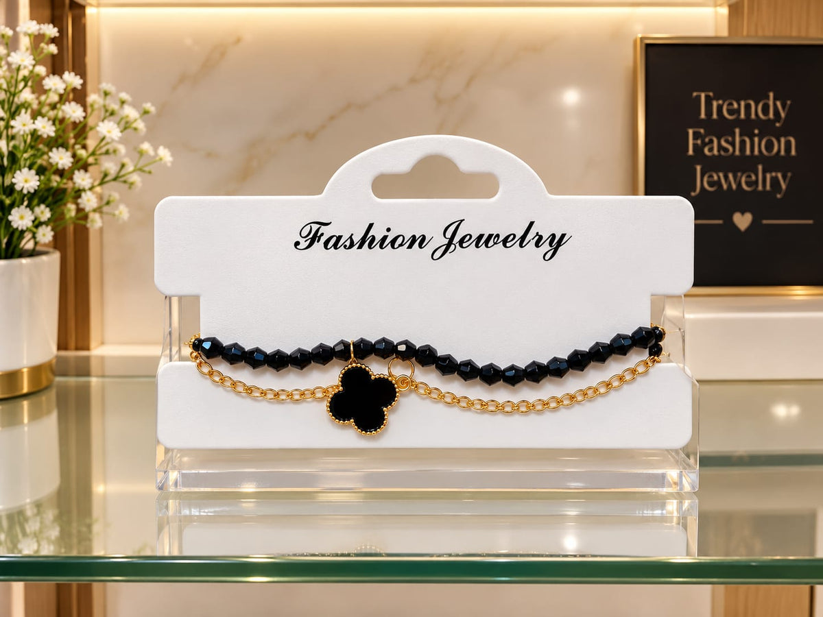 Black Clover Layered Chain Bracelet – Elegant Fashion Jewelry Add a touch of elegance to your style with this beautiful black clover layered chain bracelet.
