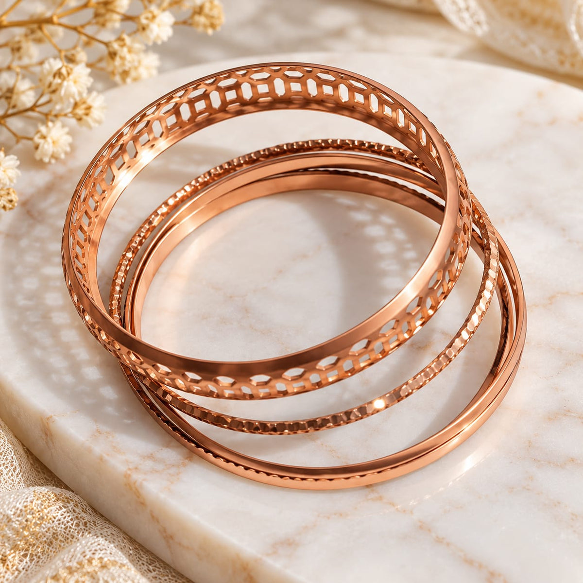 Elegant Rose Gold Bangles Set ✨ Apni khoobsurti mein izafa karein is stylish Rose Gold Bangles Set ke saath. Beautiful cutwork design, shiny finishing aur