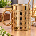Luxury Golden Ceramic Mug – Elegant Coffee & Tea Cup Add a touch of luxury and elegance to your daily routine with this beautiful Golden Ceramic Mug. Featuring a stunning metallic