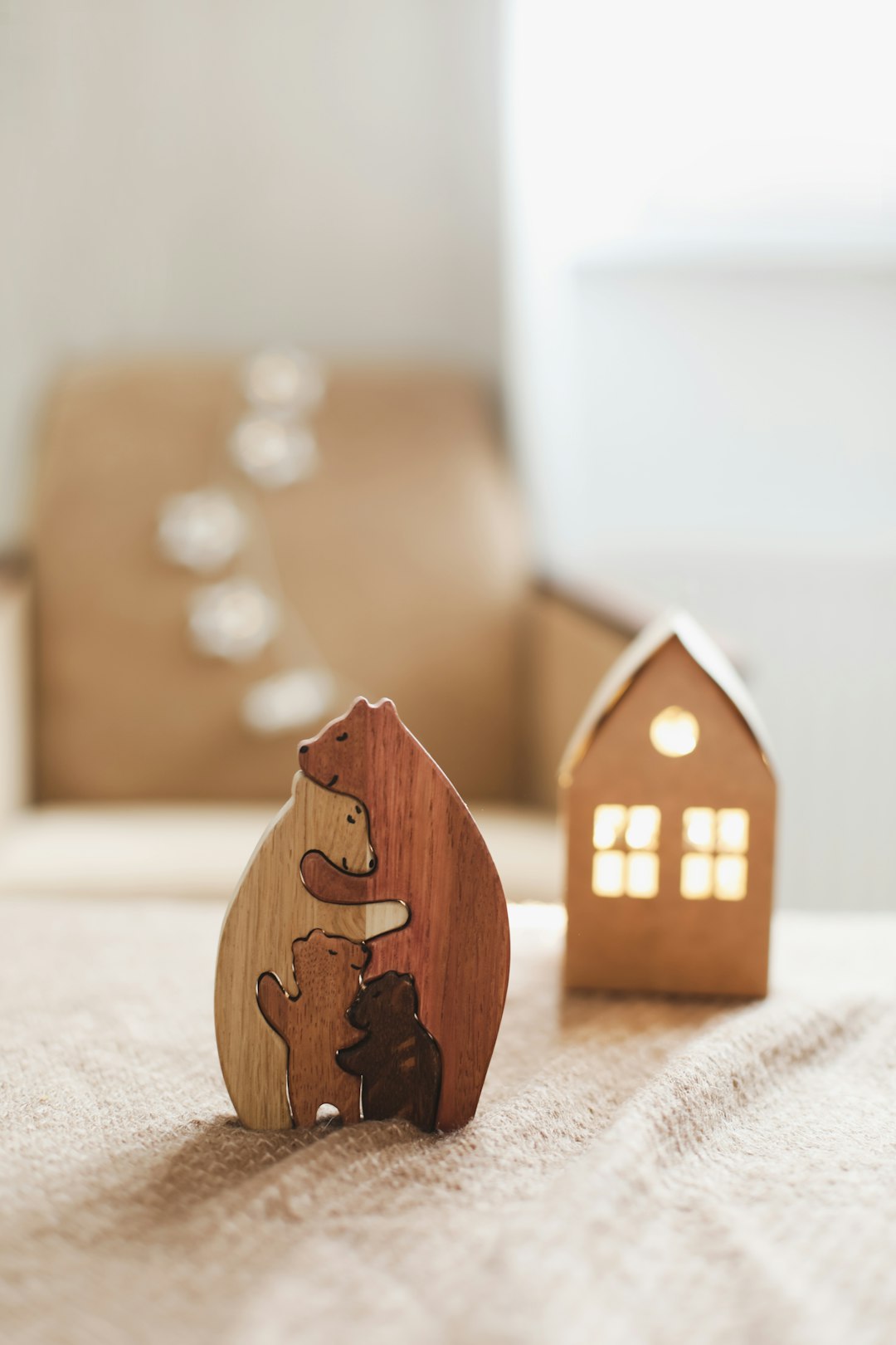Family of wooden toy bears. Handmade wooden eco-friendly toys for kids. Cozy photo